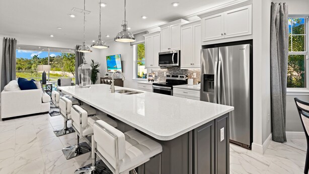 A modern kitchen with stainless steel appliances, a large island, and pendant lighting. - Paradise in naples, few mins from downtown, beaches, mercato ...... (Naples)