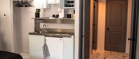 Fridge, microwave, stovetop, coffee/tea maker