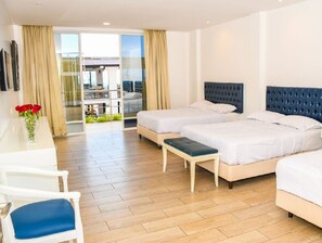 Family Triple Room, 1 Bedroom, Partial Ocean View | Down comforters, Select Comfort beds, in-room safe, desk - Hotel Kinova (Salinas)