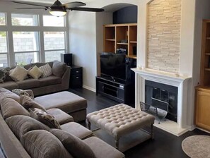 Smart TV, fireplace, DVD player, books