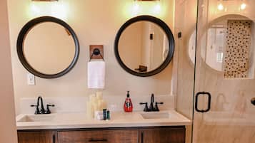 Shower, rainfall showerhead, eco-friendly toiletries, towels