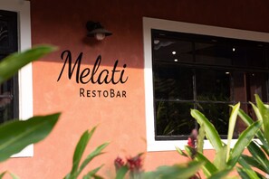 A sign for 'Melati RESTOBAR' on a building facade. - Jasminn Villas South Goa (Betalbatim)