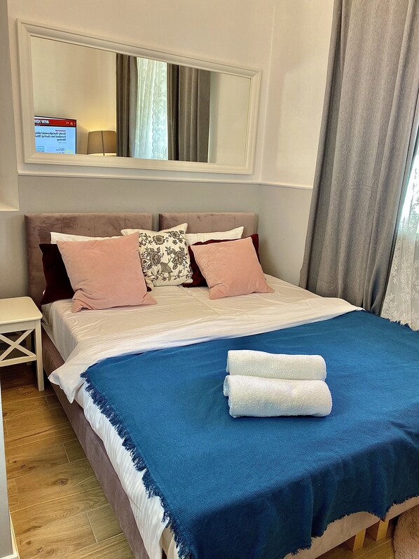 Individually decorated, desk, iron/ironing board, travel cot