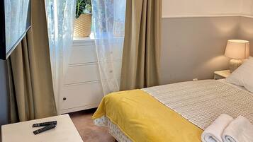 Grand Room | Individually decorated, desk, iron/ironing board, travel cot