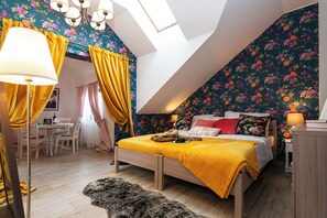 Family Room | Individually decorated, desk, iron/ironing board, travel crib