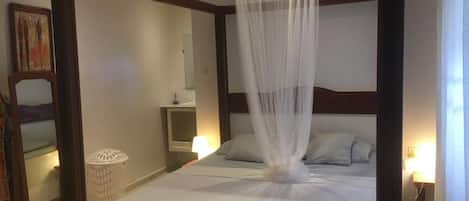 Departamento, 1 cama Queen size | 1 habitación, tabla de planchar con plancha, wifi gratis y ropa de cama