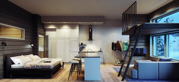Un interior moderno con cama, cocina y zona de estar.