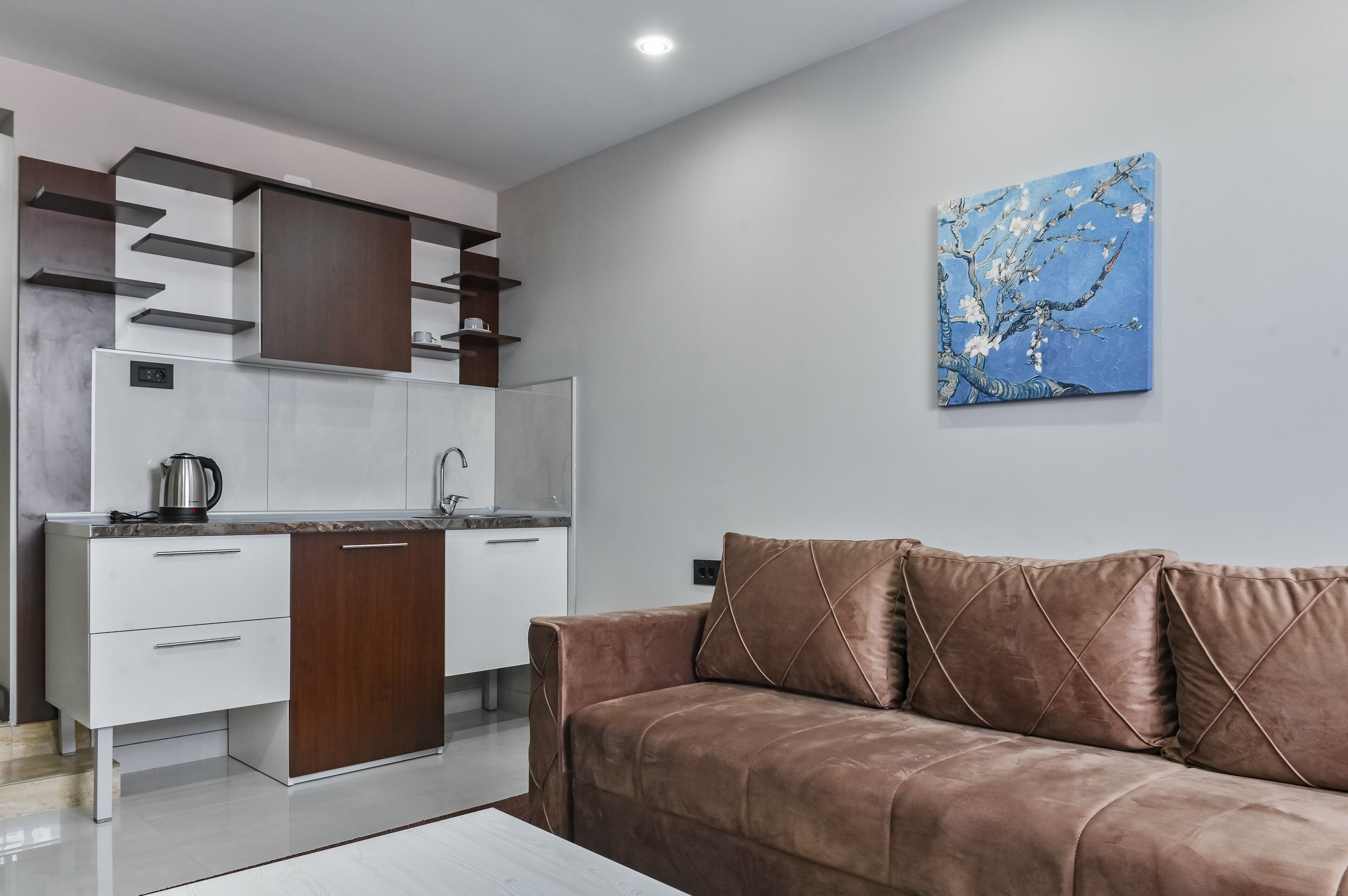 Luxury Apartment | Living area | 32-inch Smart TV with cable channels, TV, heated floors