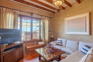 TV, fireplace - Can Pinoi by Rentallorca (Inca)