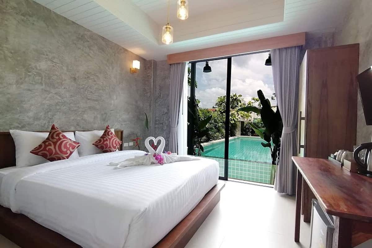 Habitación estándar, 1 cama de matrimonio grande, junto a la piscina | Decoración individual y espacio para trabajar con un portátil