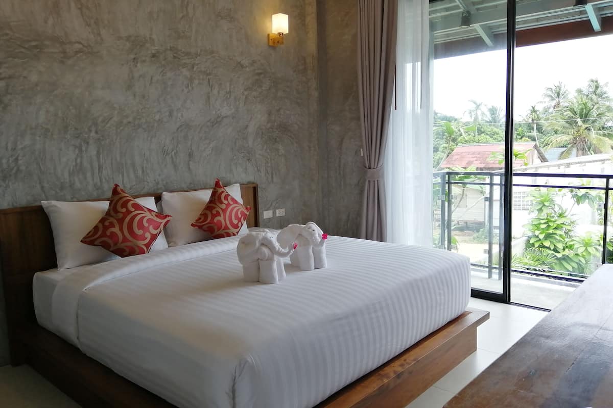 Habitación estándar, 1 cama de matrimonio grande | Decoración individual y espacio para trabajar con un portátil