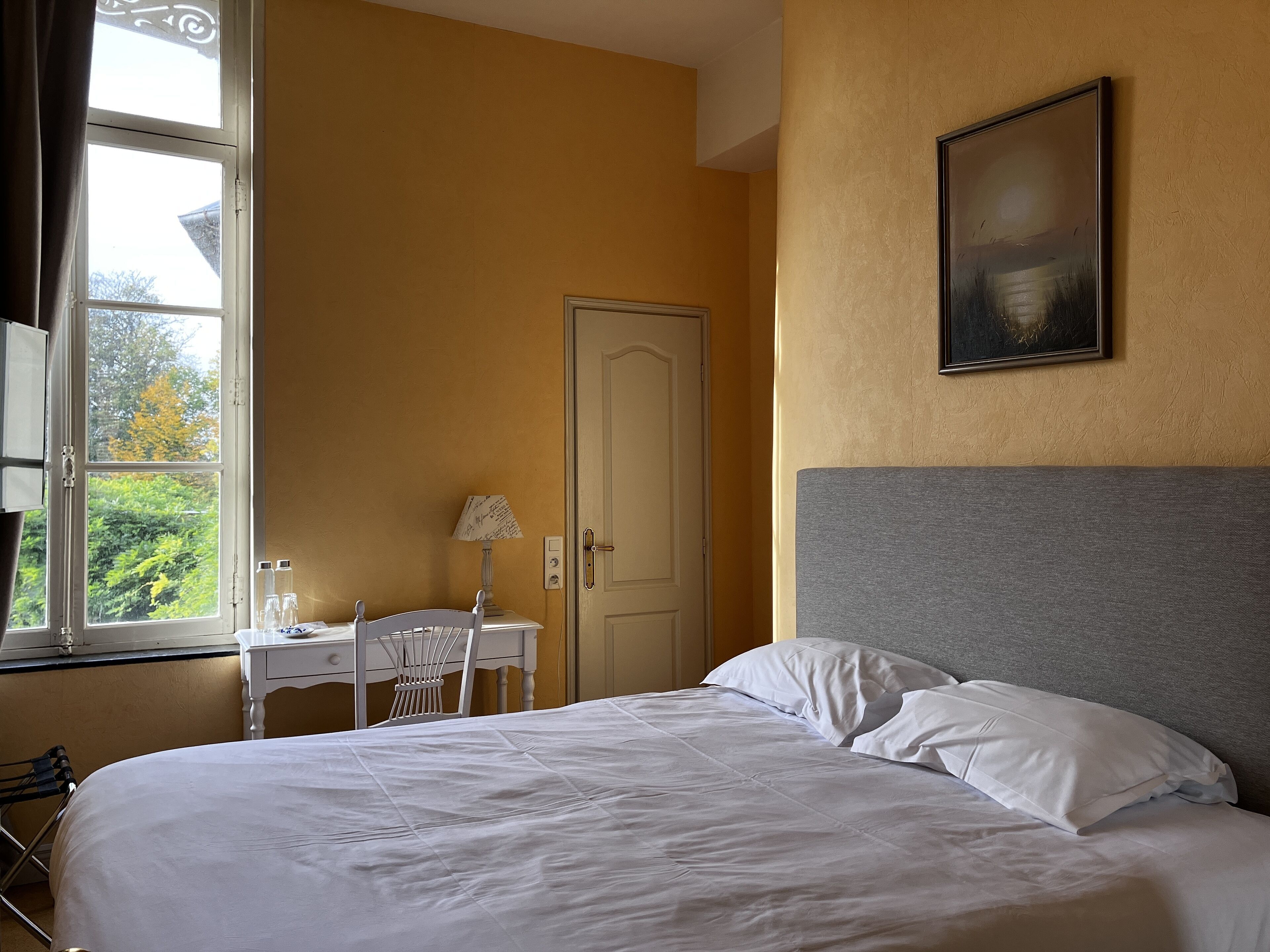 Desk, laptop workspace, free WiFi, bed sheets