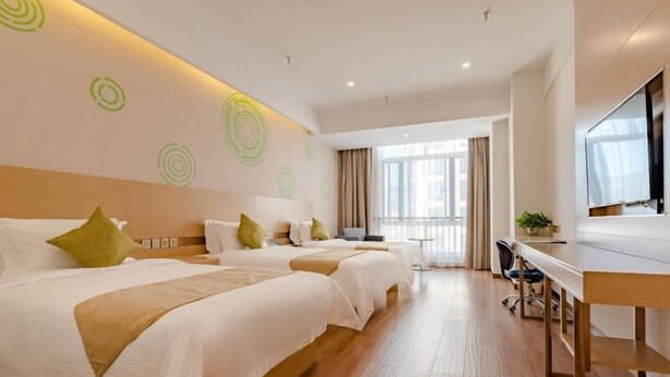 A hotel room with two beds, a desk, and a large window. - Greentree Inn Taian High Speed Railway Station Lingshan Street (Tai'an)