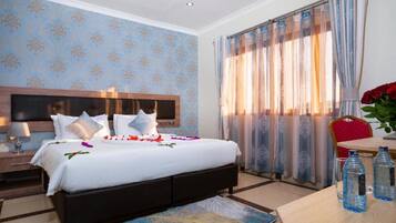 Hypo-allergenic bedding, down comforters, pillowtop beds, desk