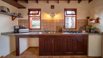 Fridge, stovetop, electric kettle, toaster