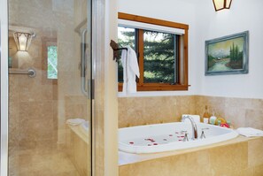 Shower, jetted tub, towels