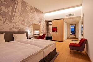 Minibar, in-room safe, desk, laptop workspace - IntercityHotel Geneva (Vernier)
