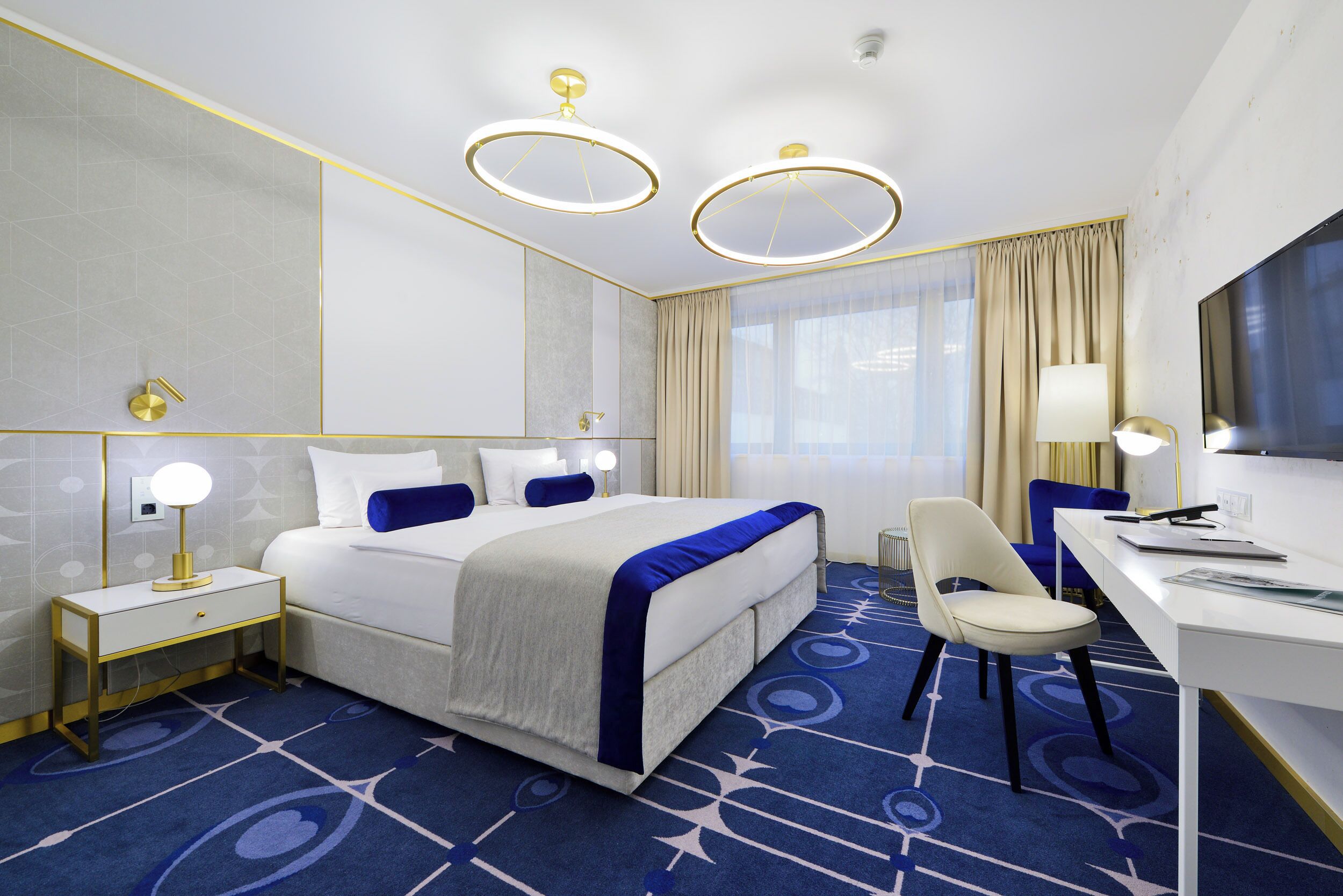 Chambre Deluxe double ou avec lits jumeaux | Literie hypoallergénique, minibar, coffre-fort pour ordinateur portable