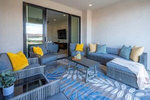 A modern living room with a sofa set, a coffee table, and a potted plant. - Arcadia 71 | Private Hot Tub * Fire Pit * Pool Table * Kid's Nook * Views (Santa Clara)