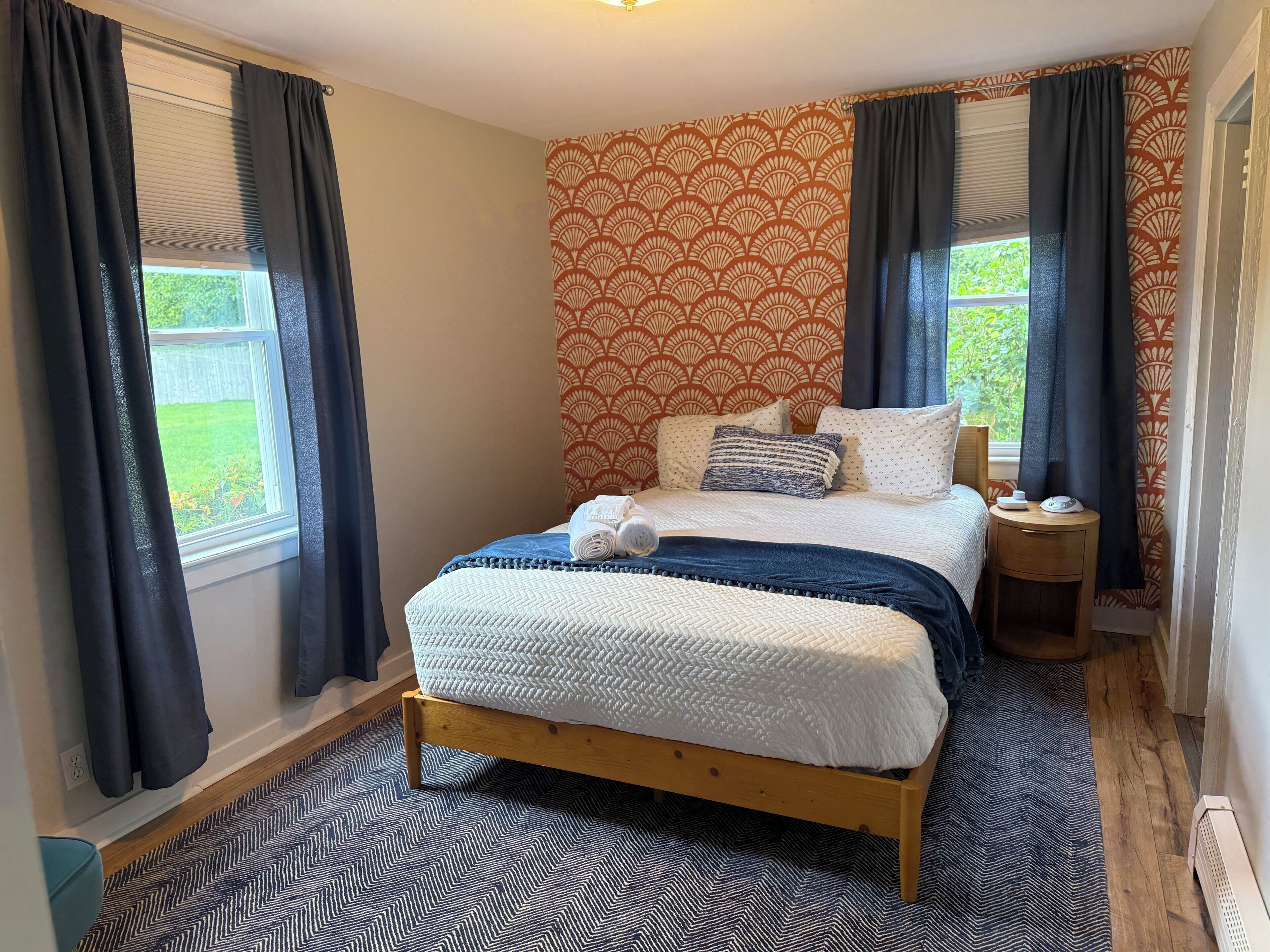 1s Floor Bedroom with queen size bed and room darkening shades.  