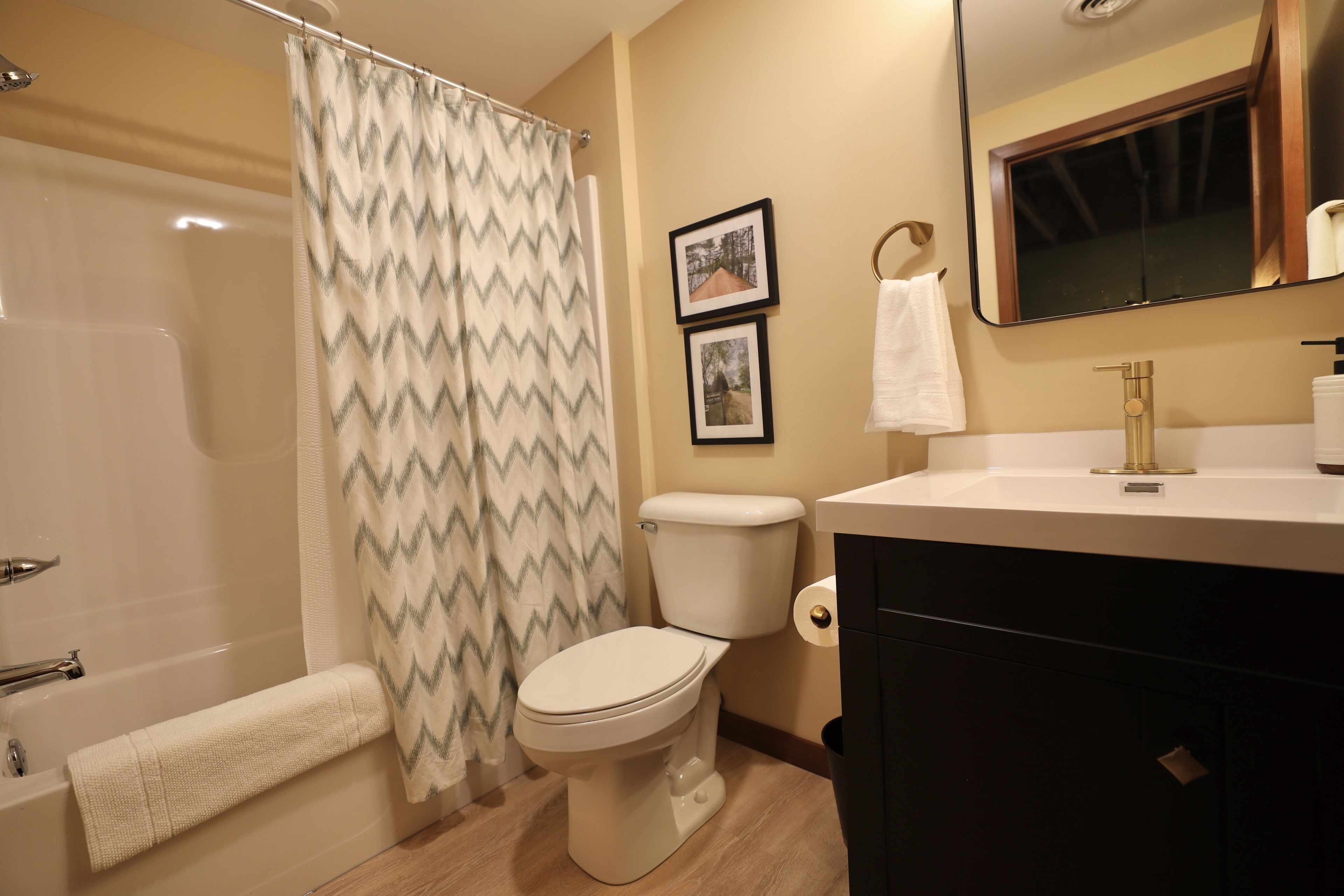 Combined shower/tub, towels, soap, shampoo