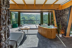 Deluxe-Zimmer, Seeblick | Wohnbereich | Fußbodenheizung