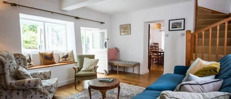 TV, fireplace, books, offices