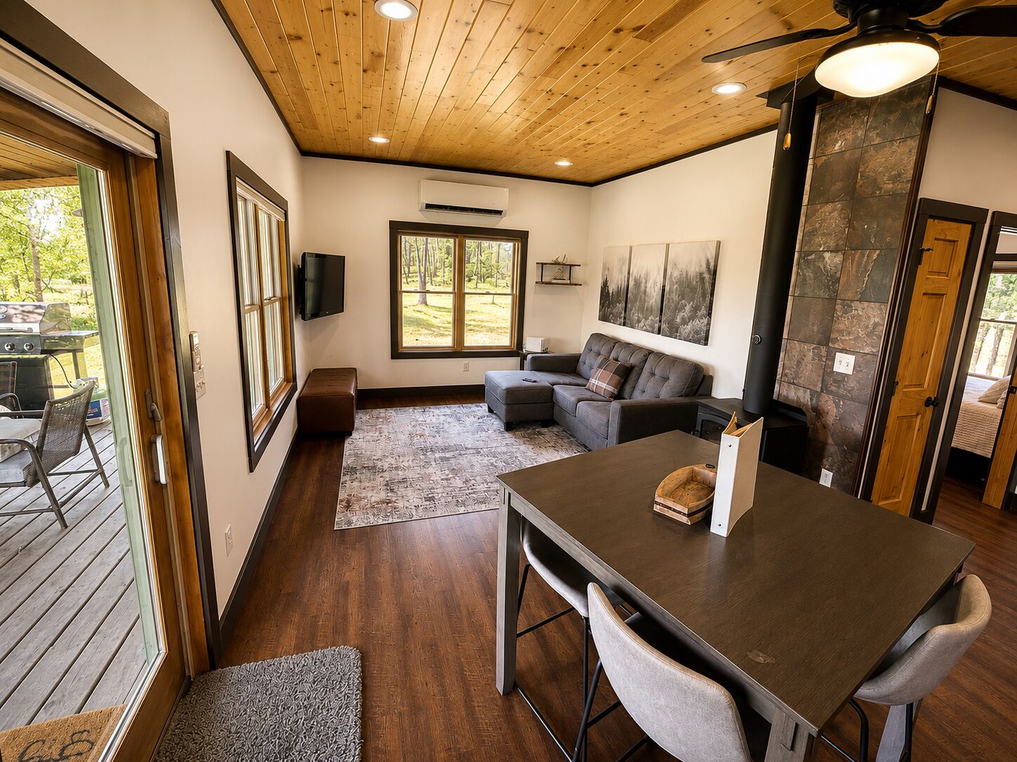 Living room & dining table over looking the lake.