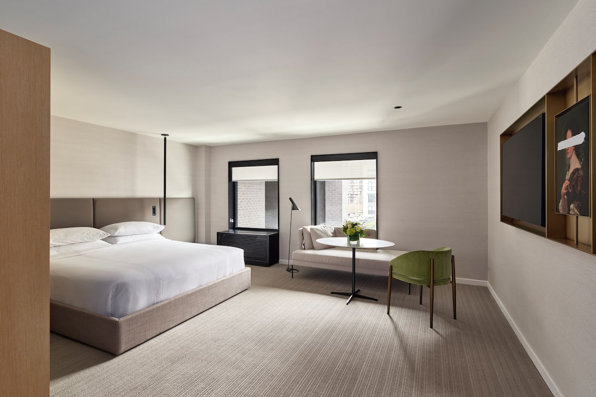 Premium Room, 1 King Bed, Mobility Accessible, Bathtub | Frette Italian sheets, premium bedding, down comforters