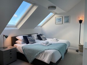 2 habitaciones, tabla de planchar con plancha y internet 