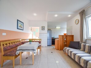 TV - Apartments Jaklin - Two Bedroom Apartment with Terrace and Sea View (Rab)