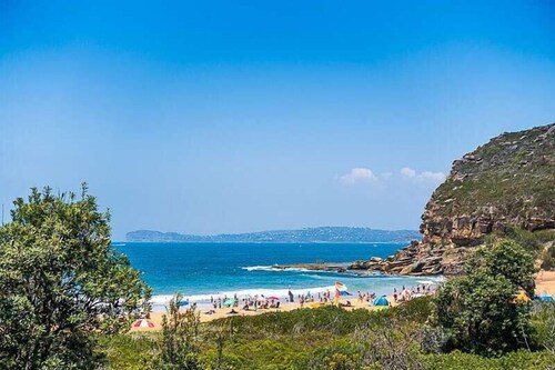 Amazing beach views with a pool. Easy walk to beach and bay