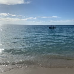 On the beach, sun loungers, beach towels