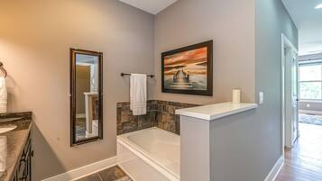 Combined shower/tub, hair dryer, towels, soap