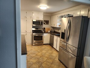 Fridge, microwave, oven, stovetop - Downtown Sanders Beach Bungalow- (Coeur d'Alene)