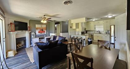 Private home with **GAME ROOM** on over half an acre of land!