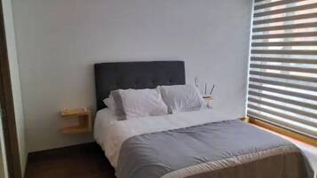 2 habitaciones, tabla de planchar con plancha y wifi gratis