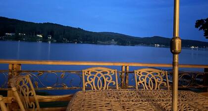 Waterfront Chalet with expansive views of lake & mountains.