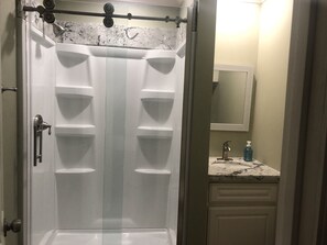 Combined shower/tub, towels, soap, toilet paper