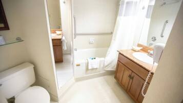 Combined shower/bathtub, hair dryer, towels, soap