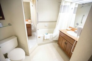 Combined shower/tub, hair dryer, towels, soap