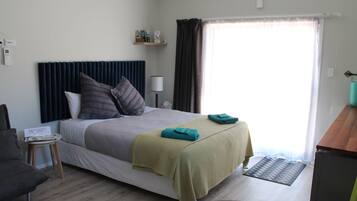 Large Studio Apartment | 1 bedroom, down comforters, blackout drapes, iron/ironing board