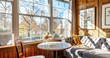 Patio Suite with Sunroom | by Henry House Stays