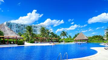 Outdoor pool, open 7:00 AM to 11:00 PM, pool loungers