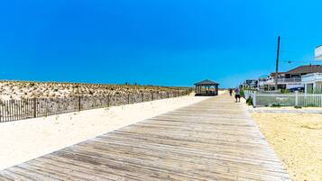 On the beach, sun-loungers, beach towels