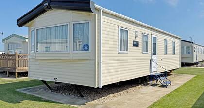 Spacious 12ft wide caravan with one double and one twin.