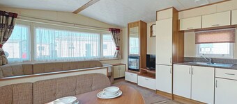 Spacious 12ft wide caravan with one double and one twin.