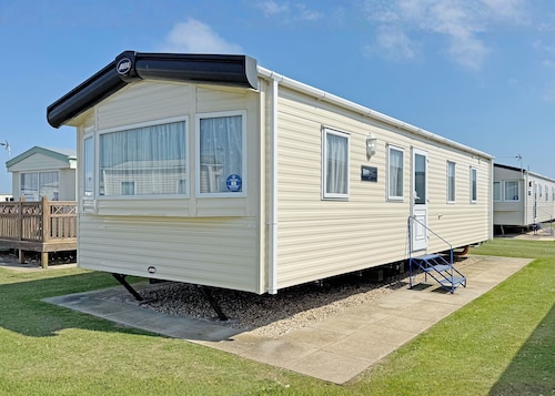 Spacious 12ft wide caravan with one double and one twin.