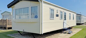 Spacious 12ft wide caravan with one double and one twin.