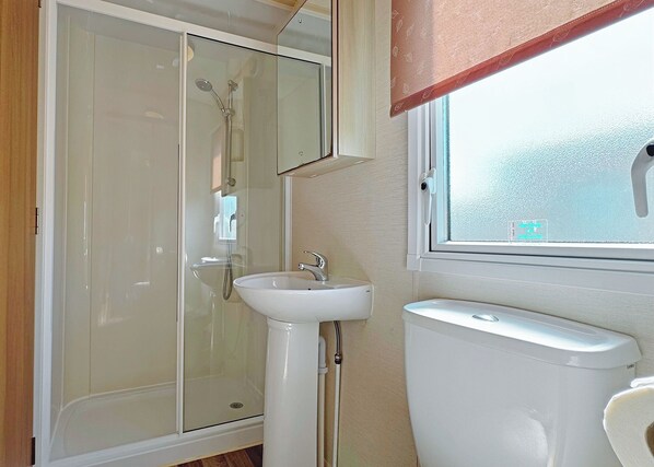 Bathroom - Spacious 12ft wide caravan with one double and one twin. (Ingoldmells, Nr Skegness)